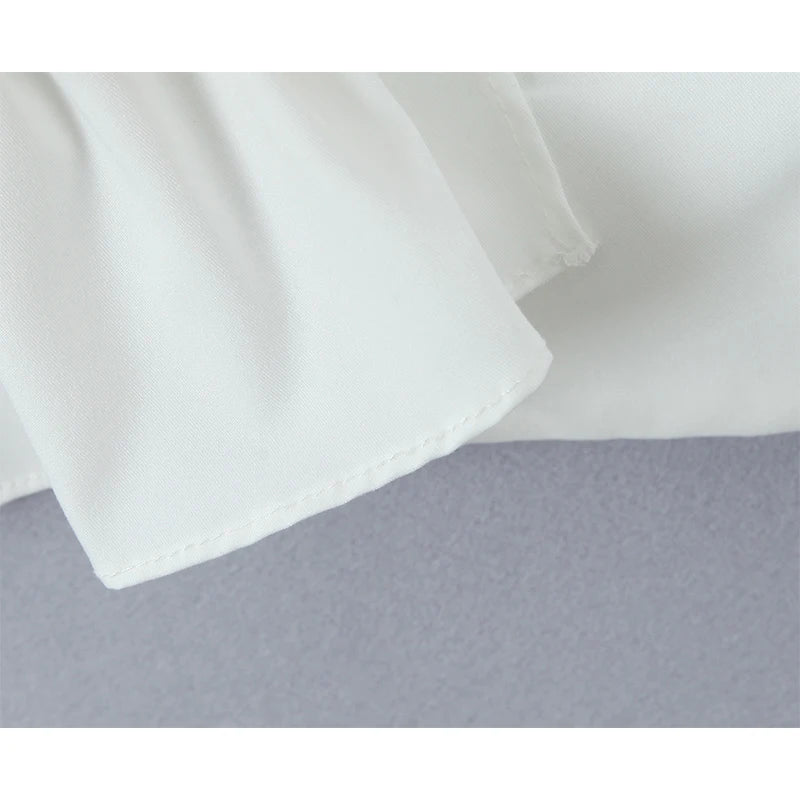 YENKYE Women's Ruffles Hem White Tank Top - Sexy Sleeveless Crop Top for Going Out 5